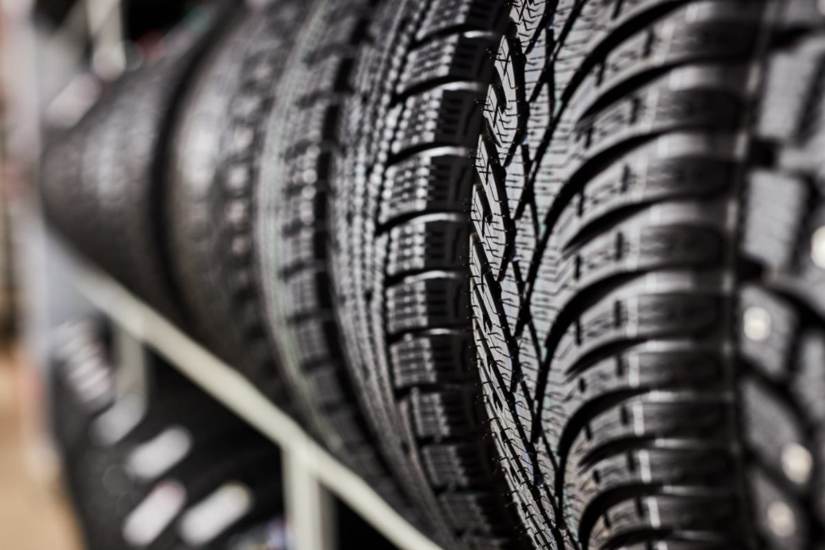 Rack of new tires for sale at Monticello Tire Company in Monticello, MS